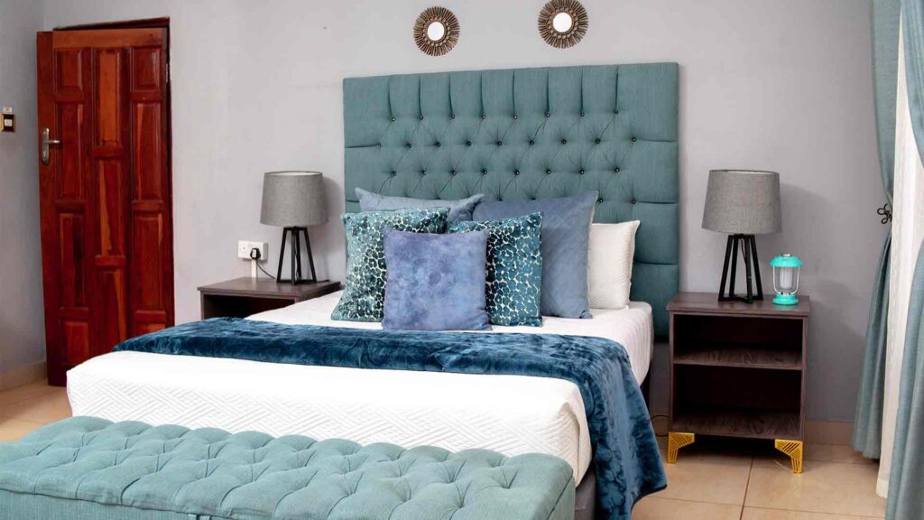 Luxury hotel room interior at Sterling Group of Hotels. Professional hospitality photography by Kakic Business, highlighting the modern decor, plush bedding, and warm ambient lighting designed to showcase the premium guest experience.